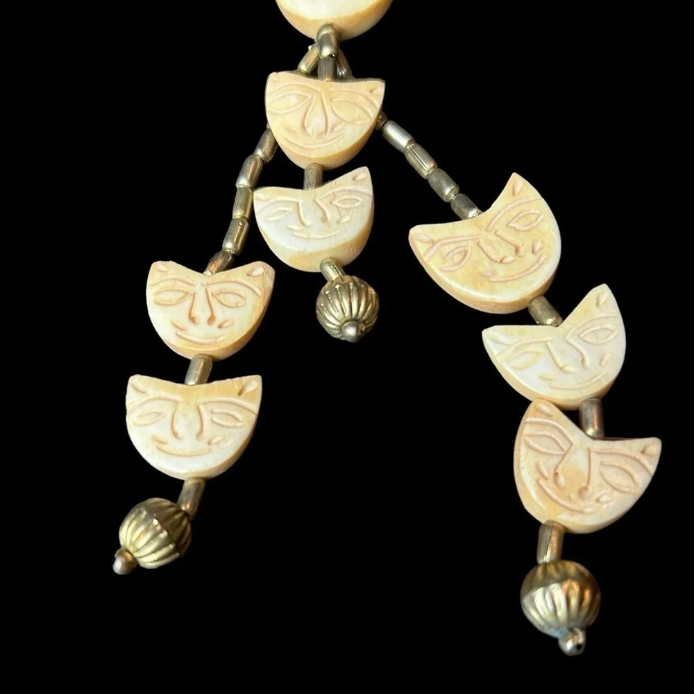 Carved and Beaded Bone Metal Multiple Strand Cat Face Hook and Loop Necklace